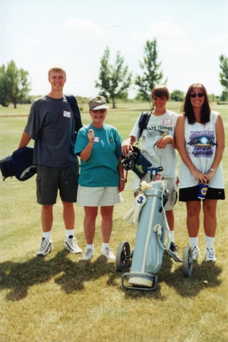 Kurt Fossen, Sally Cole, and their golf foursome enjoy the sunshine at the Beaver Creek Golf Course near Havre, Montana.