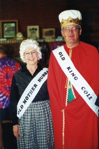 Thelma and John McLain take first prize as Old Mother Hubbard and Old King Cole during the fashion show showcasing the twentieth century.