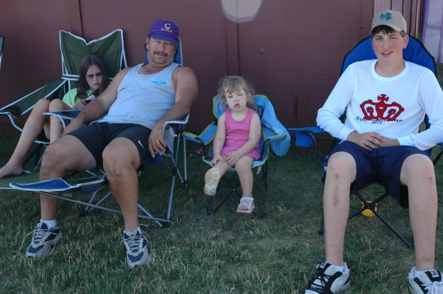 Cole Clan members relax in the shade in the Bear Paw Mountains near Havre, Montana.