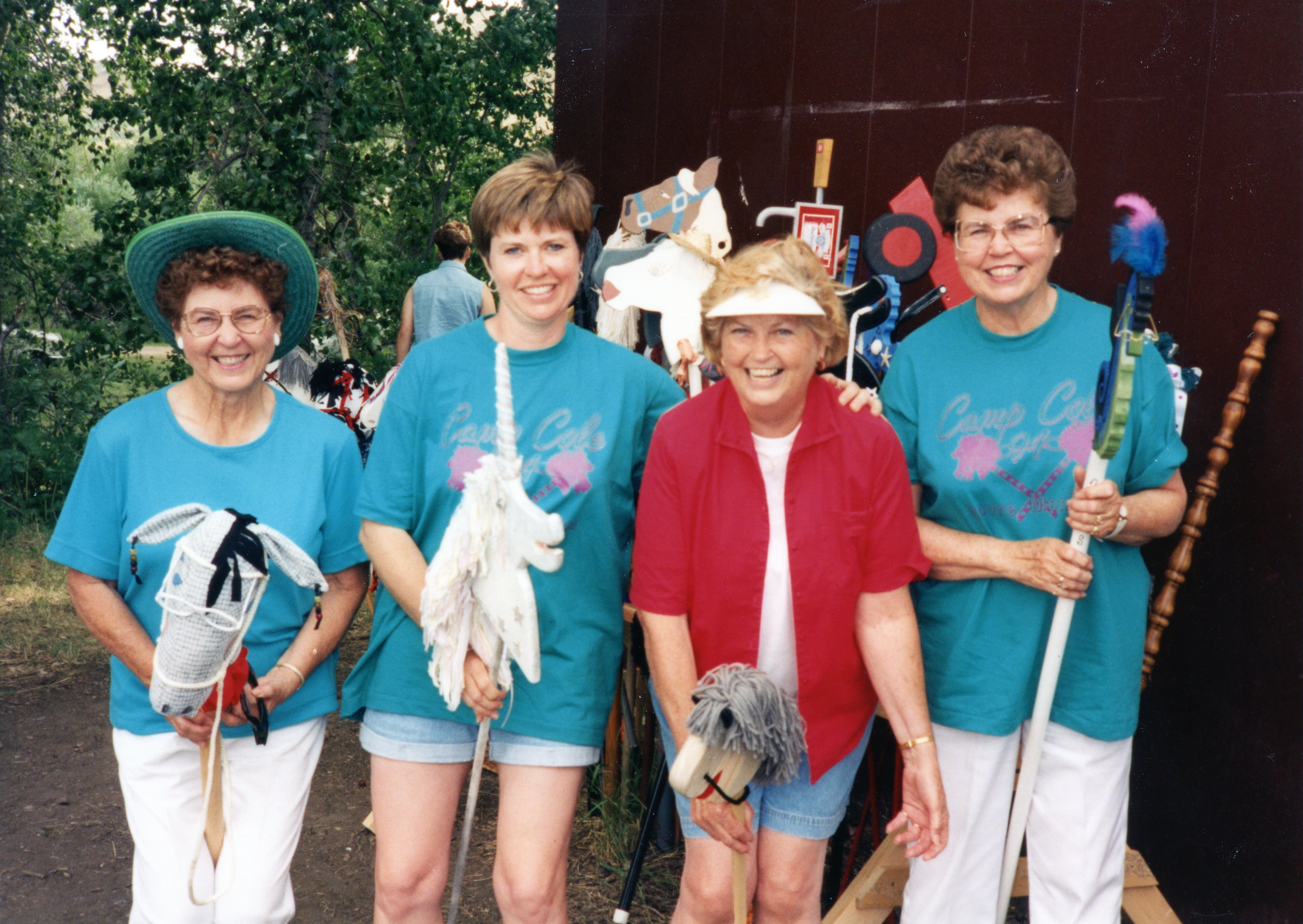 Thelma McLain, Linda Fossen, Lois Waller and Della Pimley ride their horses during Camp Cole in the Bear Paws in 1994